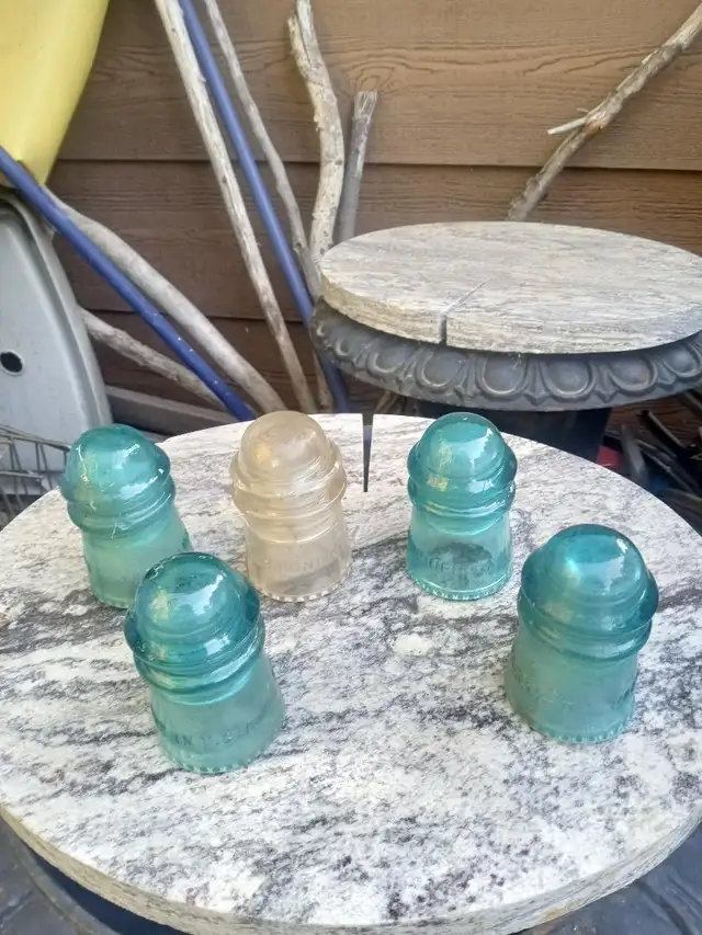GLASS INSULATORS, ANTIQUES, BLUE AND CLEAR