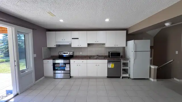 Citadel NW:  2-bedroom walkout basement suite -immediately