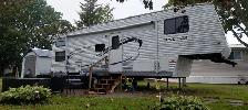 2011 Forest River 2 bed room, Fifth wheel on turnkey site.