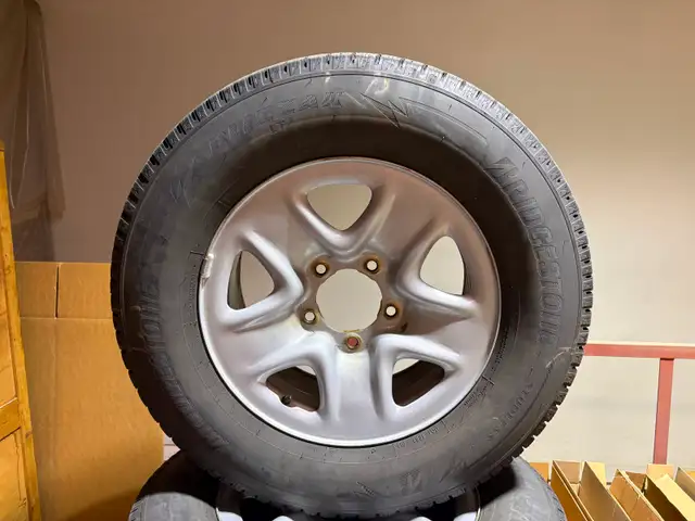 Bridgestone Blizzak LT tire/ rims