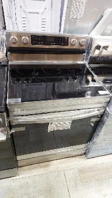 Stove 30' Samsung NE63A6511SS — 30' 6.3 cu. ft. New Open Box - Photo 5