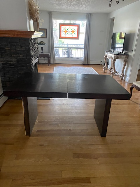 Wood Table 60 inches by 36 inches, solid, in good condition  $75