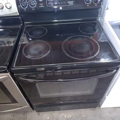Two Electric Ranges - GE $150, Frigidaire $100 - with Warranty