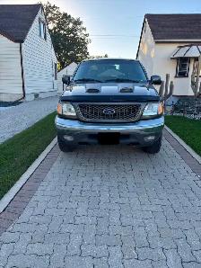 2002 Ford F-150 Lariat for sale, with free motorcycle included