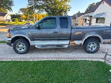2002 Ford F-150 Lariat for sale, with free motorcycle included - Photo 4