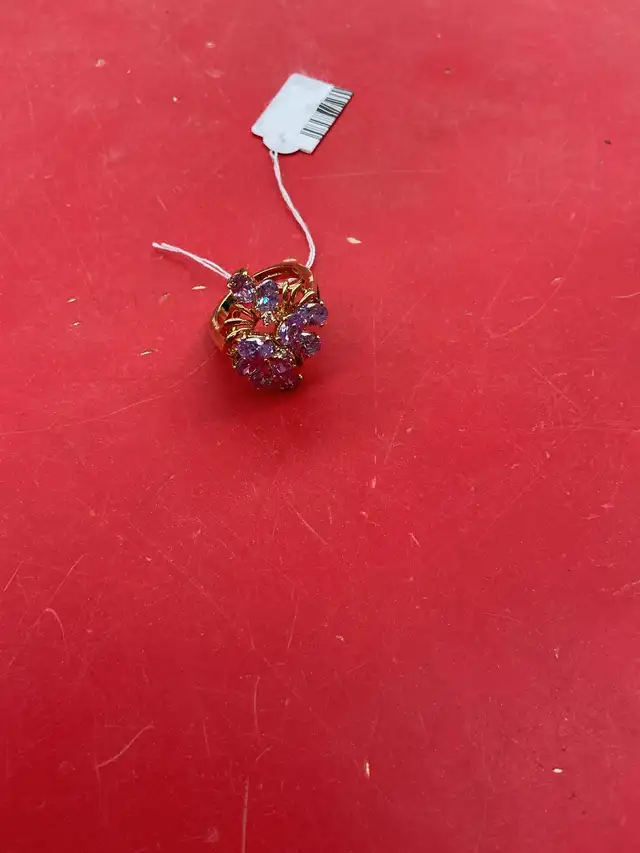 bague en stainless avec pierre mauve