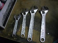 4 AJUSTABLE WRENCHES