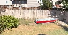 Aluminum Sears Boat with trolling motor and battery charger