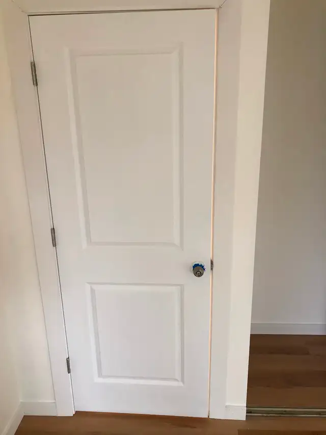 Primed interior doors and baseboards casing all trim supply/inst