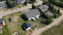 Real Estate Auction: 12-Bedroom Duplex - Kerrobert, SK