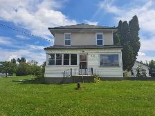 Charming 4 Bedroom Home in Bridgenorth | Sunroom & Gas Fireplace - Photo 13