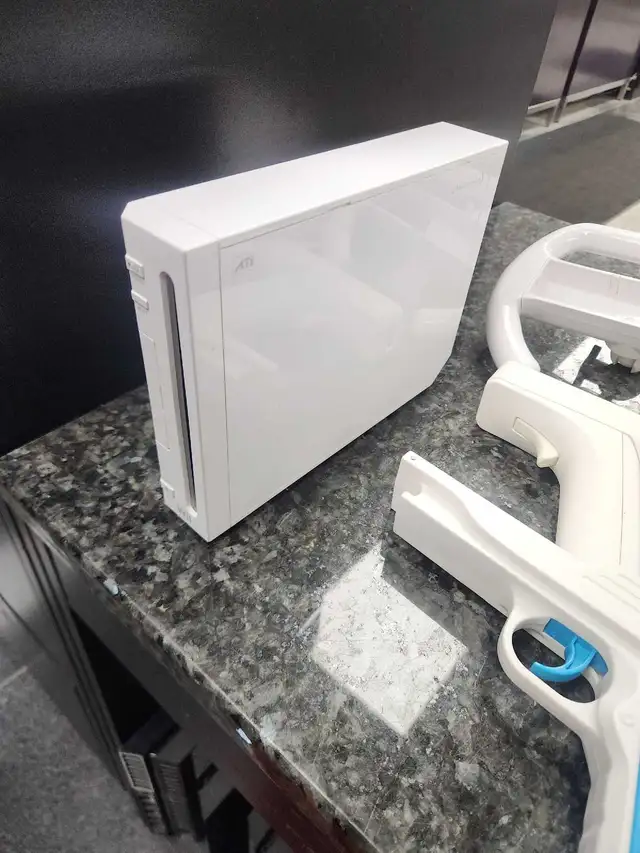 Nintendo Wii has power cord and AV