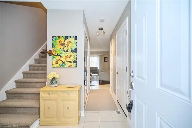3 Beds,2 Bath,Finished Basement,Appliances,A.C.Garage,Patio,Town