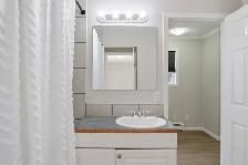 1 bedroom carriage suite Airdrie for rent rental private laundry - Photo 9