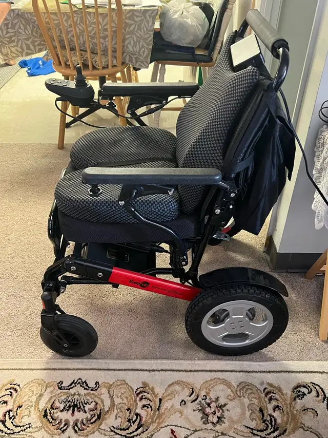 Battery wheel chair