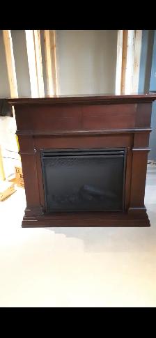 Electric fireplace like new with remote for sale