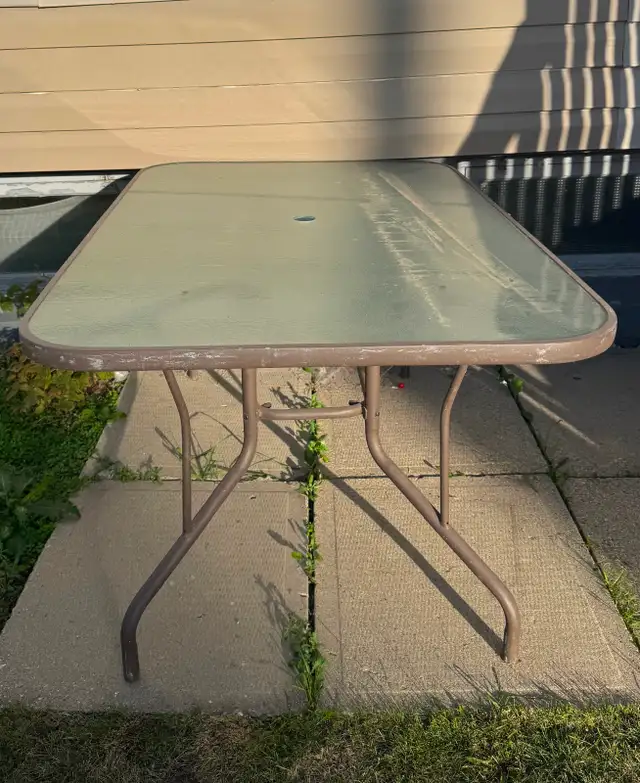 Glass top outdoor table