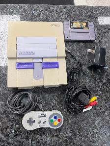 Super Nintendo with Controller and Super Mario All Stars Cart