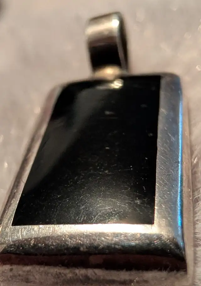 Vintage stamped 925 Sterling Silver Pendant - Glows under UV