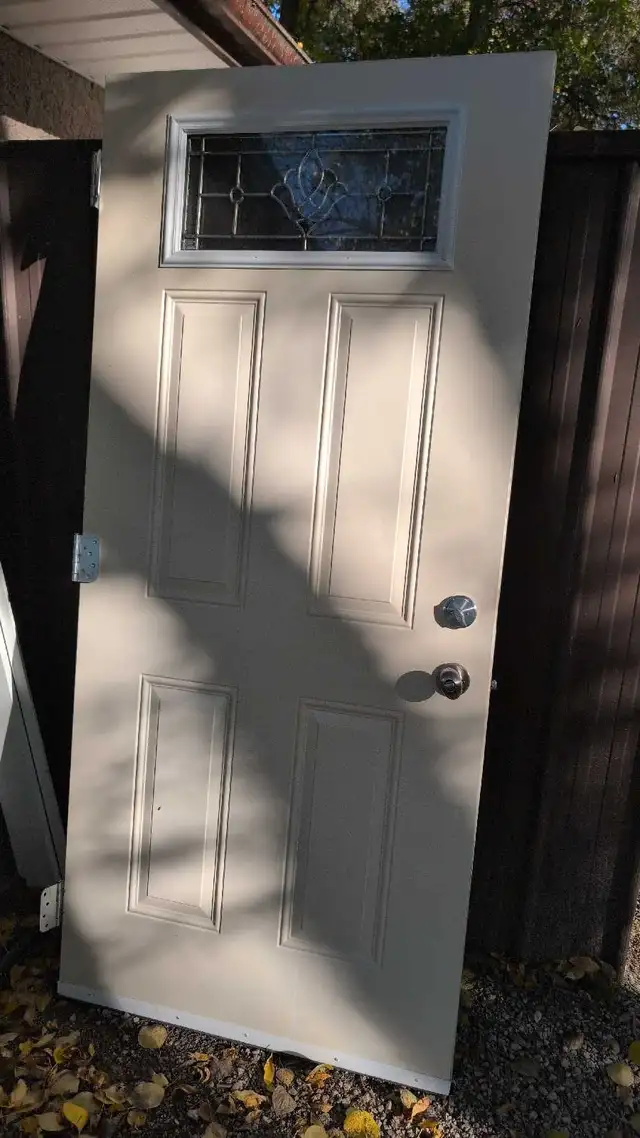 36' steel insulated door with window