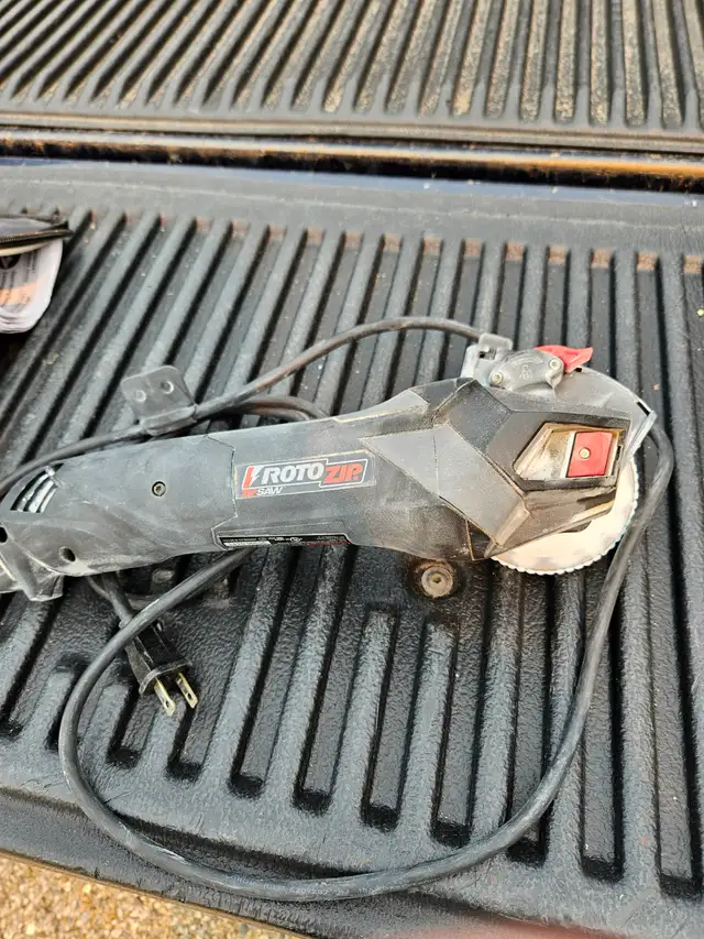 RotoZip Skill Saw, 4 inch, works great. $ 10