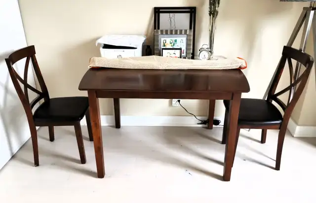 Solid wood dining table and 4 high back chairs