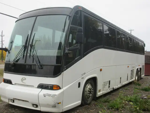 1999 MCI 56 passenger bus