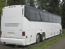 1999 MCI 56 passenger bus - Photo 5