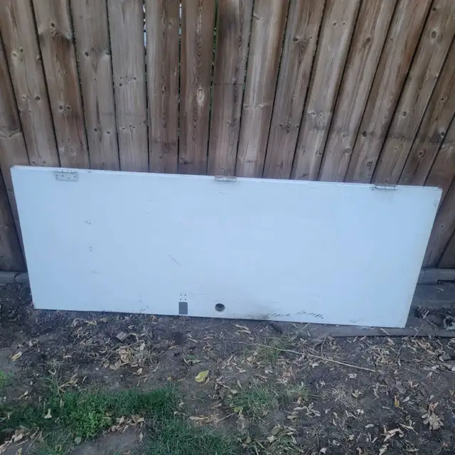 Free steel entrance door 32' x 80'