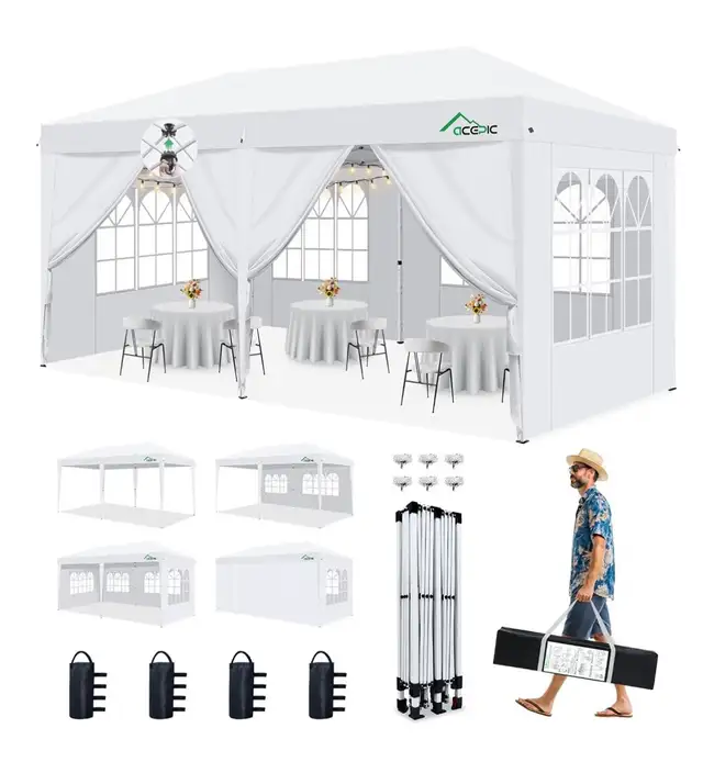 new  10x20 white party tent asking 200$ asap 514-754-6397