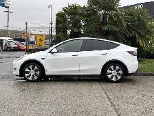 2023 Tesla Model Y Long Range 4dr All-Wheel Drive Sport Utility - Photo 6