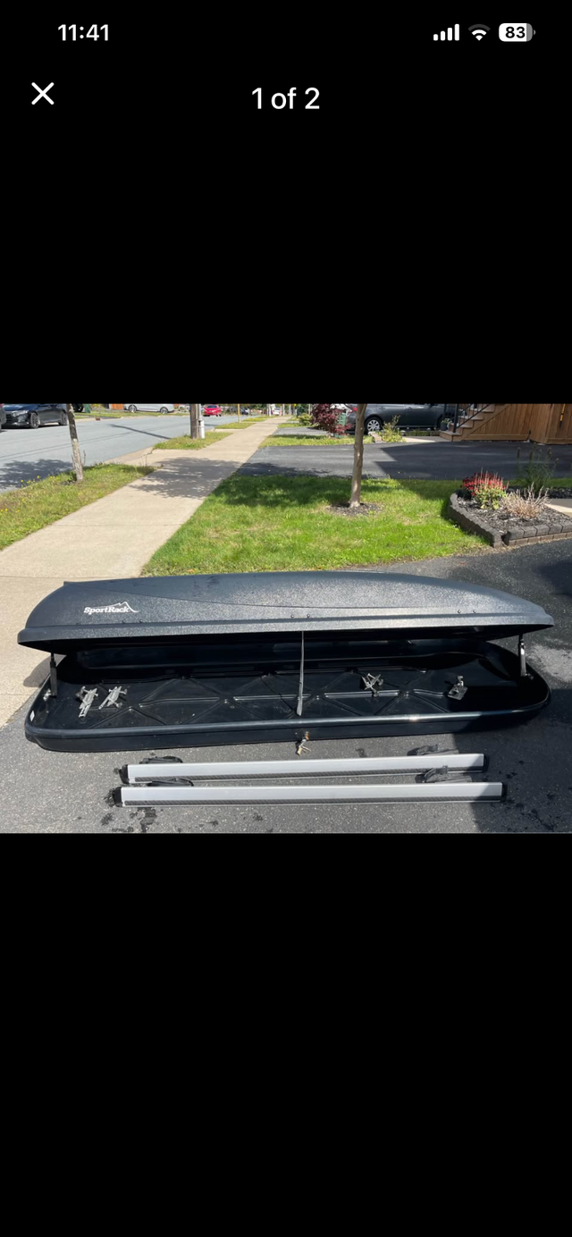 Roof top cargo carrier with Thule crossbars