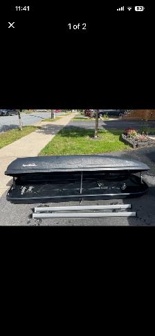 Roof top cargo carrier with Thule crossbars
