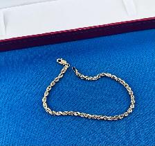 bracelet torsade en or jaune 10k - Photo 2