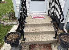 Cement Front Steps with Metal Railings