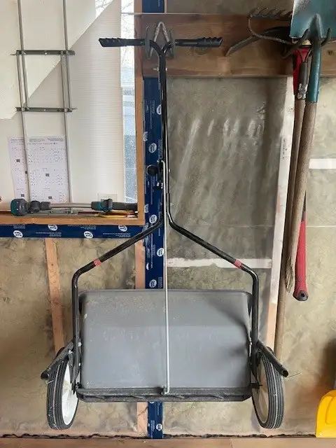 Walk behind seed spreader
