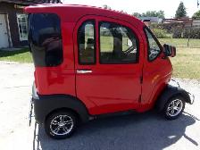 Enclosed Daymak Mobility Scooter ( NEEDS REPAIR )