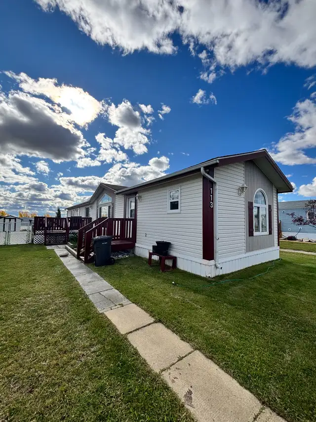 Well-Maintained Mobile Home with Fenced Yard
