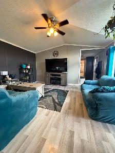 Well-Maintained Mobile Home with Fenced Yard - Photo 3