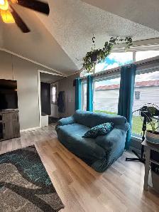Well-Maintained Mobile Home with Fenced Yard - Photo 4