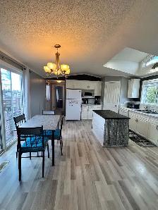 Well-Maintained Mobile Home with Fenced Yard - Photo 5