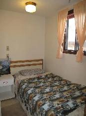 Furnished bedroom for a single with a private 2-piece bathroom $