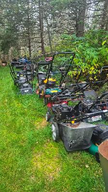 Clean up...lots of push mowers....Fix up or use for parts