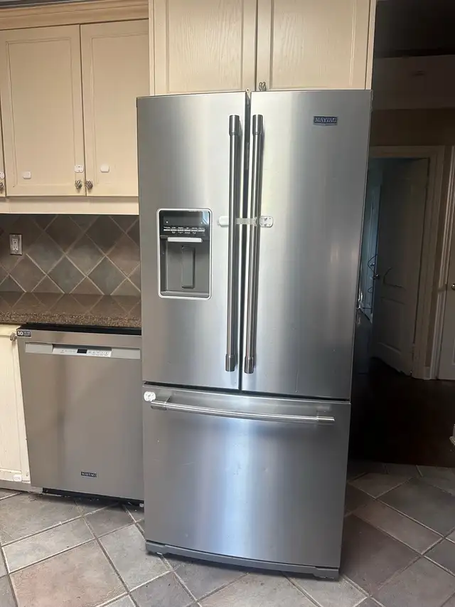 Maytag stainless steel refrigerator and dishwasher set