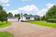 Bungalow with Double Car Garage on a  2.33 acres lot !