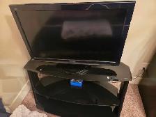 Panasonic TV and glass stand - Photo 3