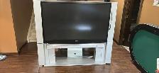 FREE 62" Toshiba TV with matching Stand and remote