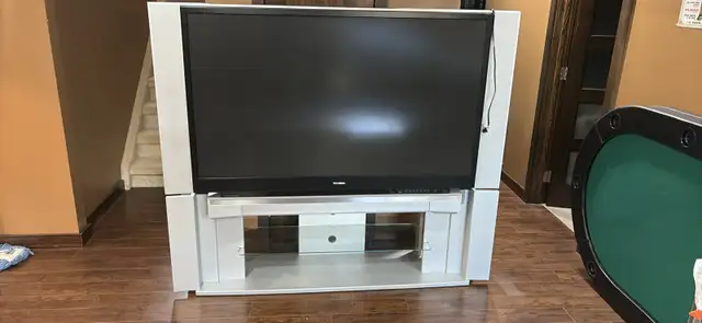 62" Toshiba TV with matching stand and remote