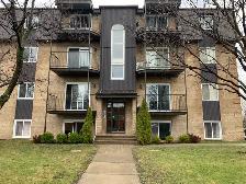 LAPRAIRIE, 4 1/2 style condo RENOVÉ a louer pres services et tra