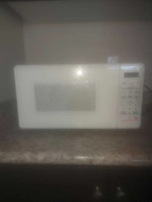 Used microwave for sale in good condition.